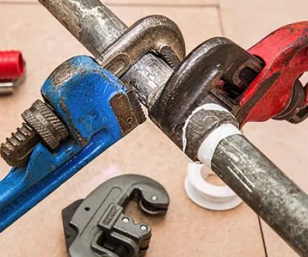 Woodhaven Plumbing & Heating Corporation.