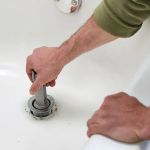 How to Choose Between Repairing or Replacing a Bathtub Drain