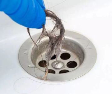 How to Prevent Drain Blockages from Hair and Soap Scum