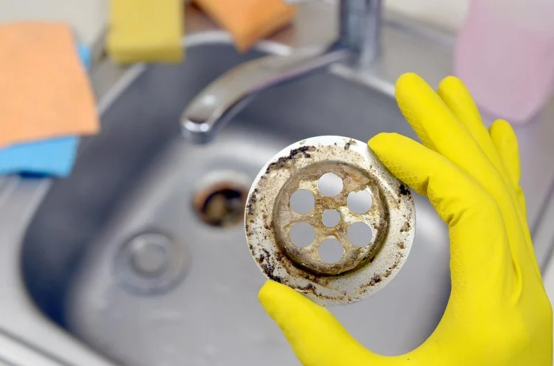 Why Is My Clogged Drain Happening? Common Causes & Solutions