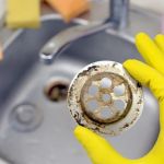 Why Is My Clogged Drain Happening? Common Causes & Solutions