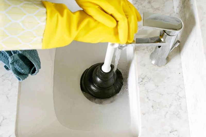 How to Unclog a Drain Using a Plunger