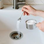How to Fix a Clogged Bathtub Drain with Standing Water