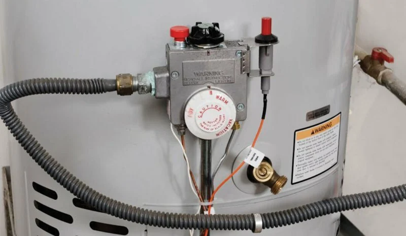 Why Is My Water Heater Pilot Light Orange? Causes and Solutions