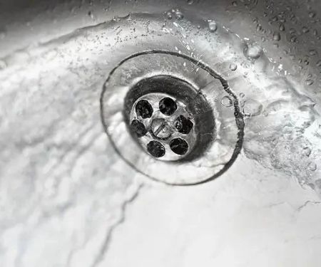 Why Is My Sink Draining Slowly After Snaking? Common Causes and Solutions