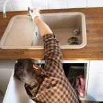 Why Your Kitchen Sink Is Backing Up Into the Dishwasher and How to Fix It