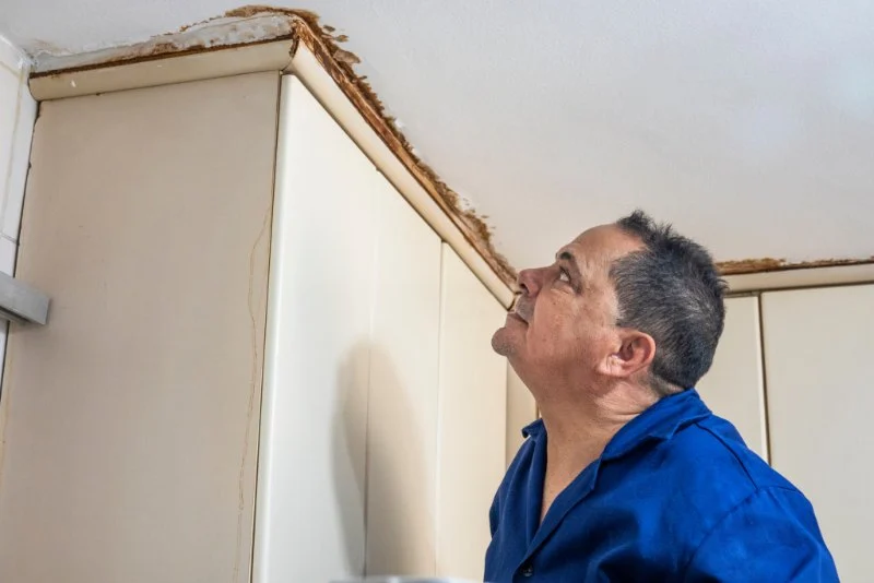 Effective Steps to Repair a Leaking Pipe Behind Your Cabinet