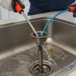 How to Fix a Slow Draining Kitchen Sink Permanently and Stop Recurring Clogs