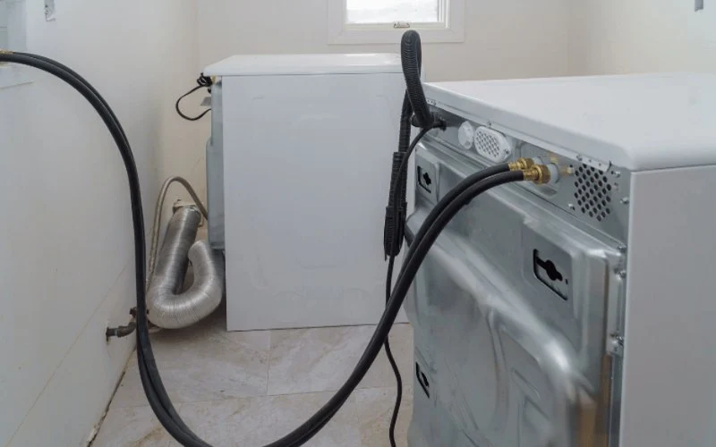 Why Is My Washing Machine Drain Backing Up? Causes and Fixes
