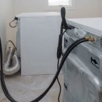 Why Is My Washing Machine Drain Backing Up? Causes and Fixes