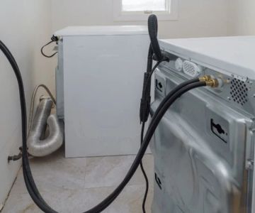 Why Is My Washing Machine Drain Backing Up? Causes and Fixes