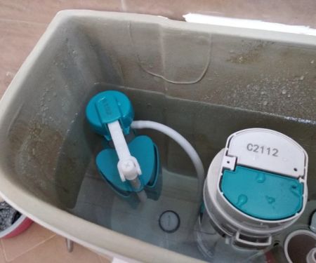 Why Is My Toilet Tank Water Level Too High? Causes & Fixes